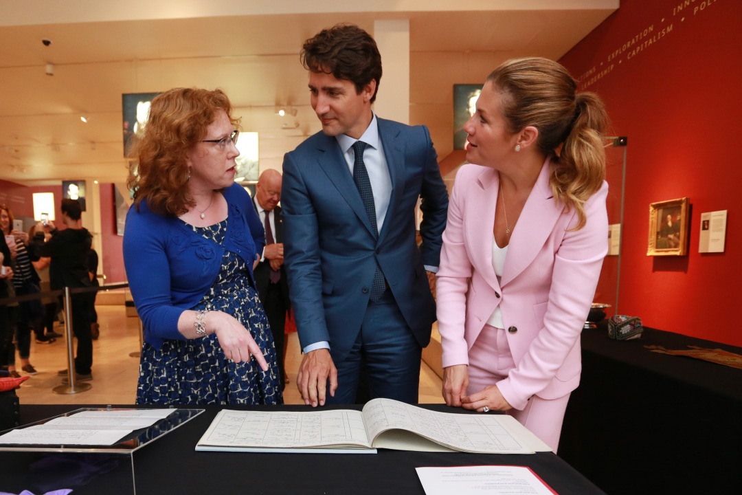 Canadian Prime Minsiter Justin Trudeau looks at NRS documents on his family history at the National Museum of Scotland